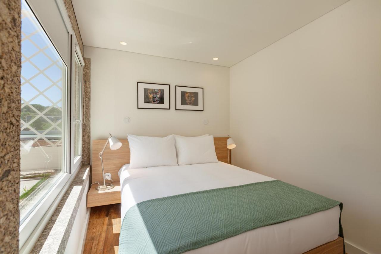 Polery Apartments Center 吉马良斯 外观 照片